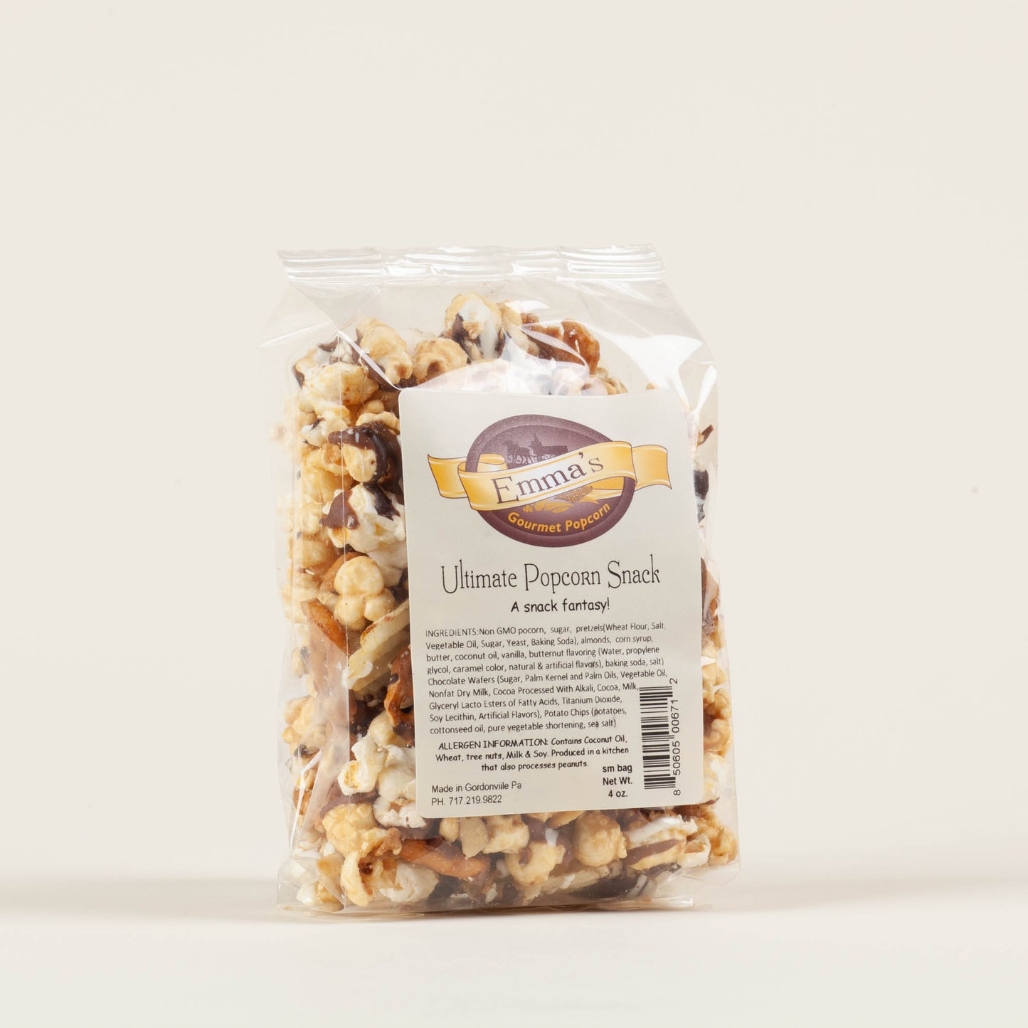 Small bag of Emma's Ultimate Popcorn Snack on a light background, toffee and sweet-salty popcorn with triple chocolate drizzle and potato chips, made in Lancaster County, PA.