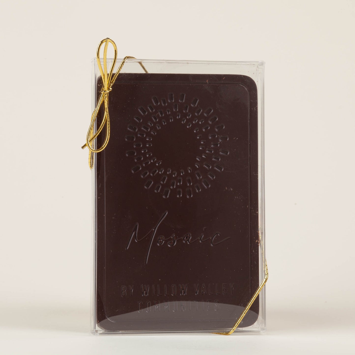 Custom chocolate bar embossed with Mosaic's Logo. Perfect for wedding and event favors.