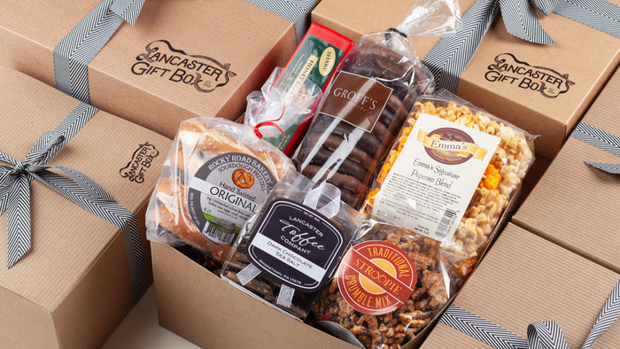 Send a Taste of Lancaster Gift Box filled with the iconic snack foods of Lancaster County. These gift baskets arrive boxed with a hand-tied bow.