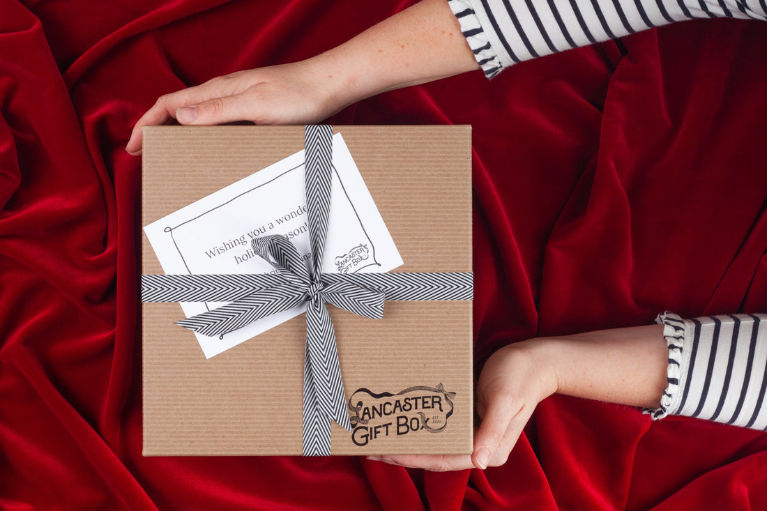 Curated Pennsylvania snack gift boxes with hand-tied bows ready for corporate holiday shipping by Lancaster Gift Box.