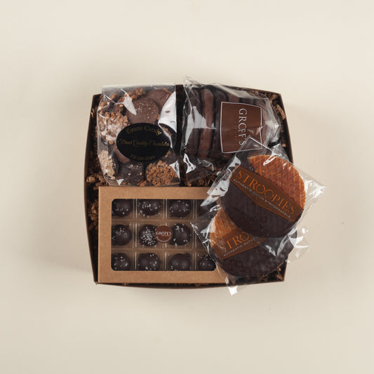 A decadent Pennsylvania chocolate client appreciation gift box with small-batch truffles, toffee nonpareils, chocolate pretzels & stroopwafels.