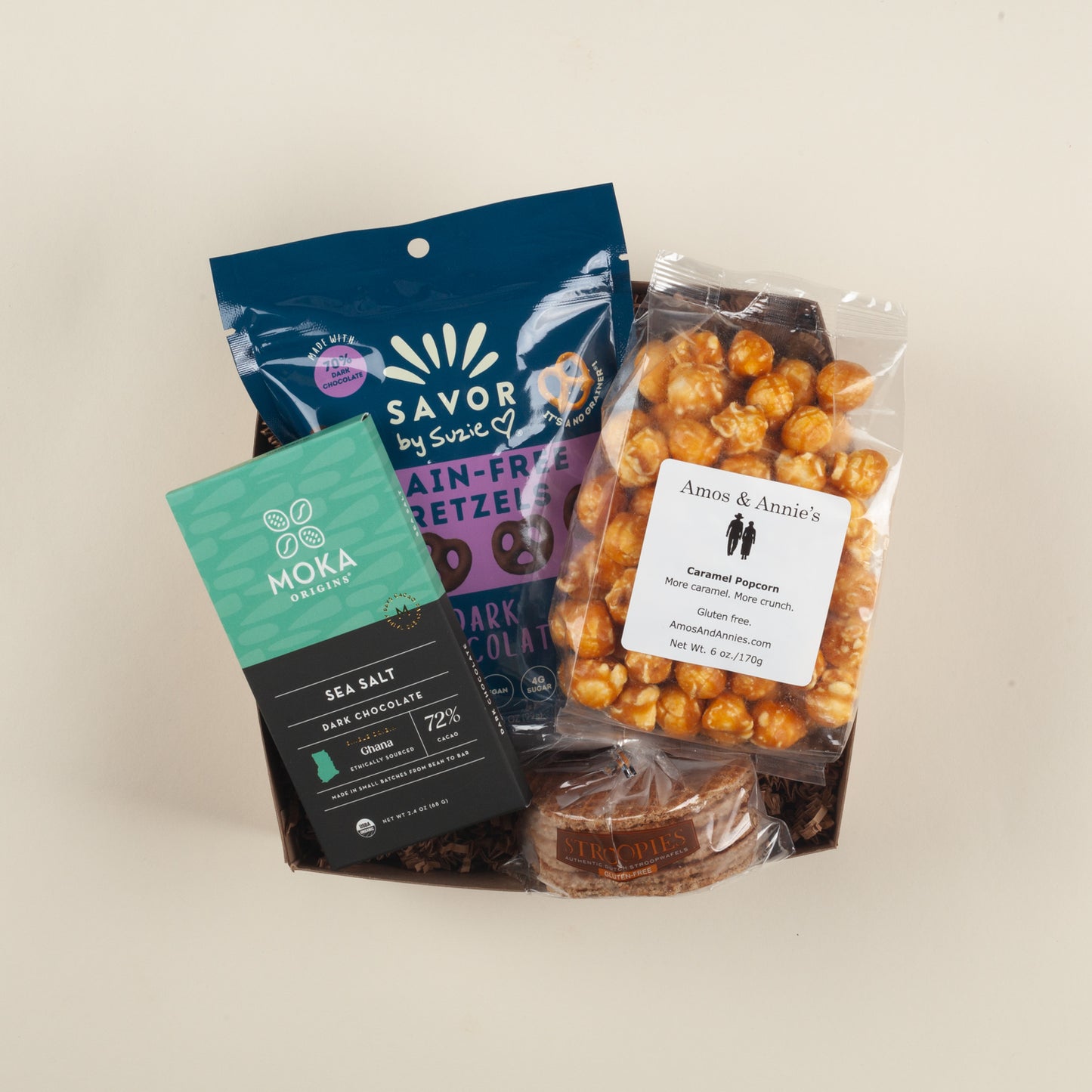 A thoughtful gluten-free Pennsylvania gift box with golden caramel popcorn, crunchy grain-free pretzels, chewy stroopwafels & rich sea salt chocolate.