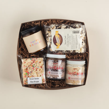Festive Pennsylvania birthday gift box with a Happy Birthday candle, rich dark chocolate popcorn, buttery sprinkles rice krispie & two indulgent jarcakes.
