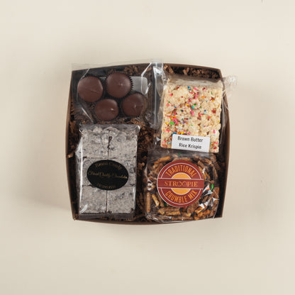 A fun Pennsylvania birthday or thank-you gift box packed with PB cups, Rice Krispie treats, cookies & cream bark and stroopie crumble mix.