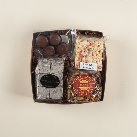 A fun Pennsylvania birthday or thank-you gift box packed with PB cups, Rice Krispie treats, cookies & cream bark and stroopie crumble mix.