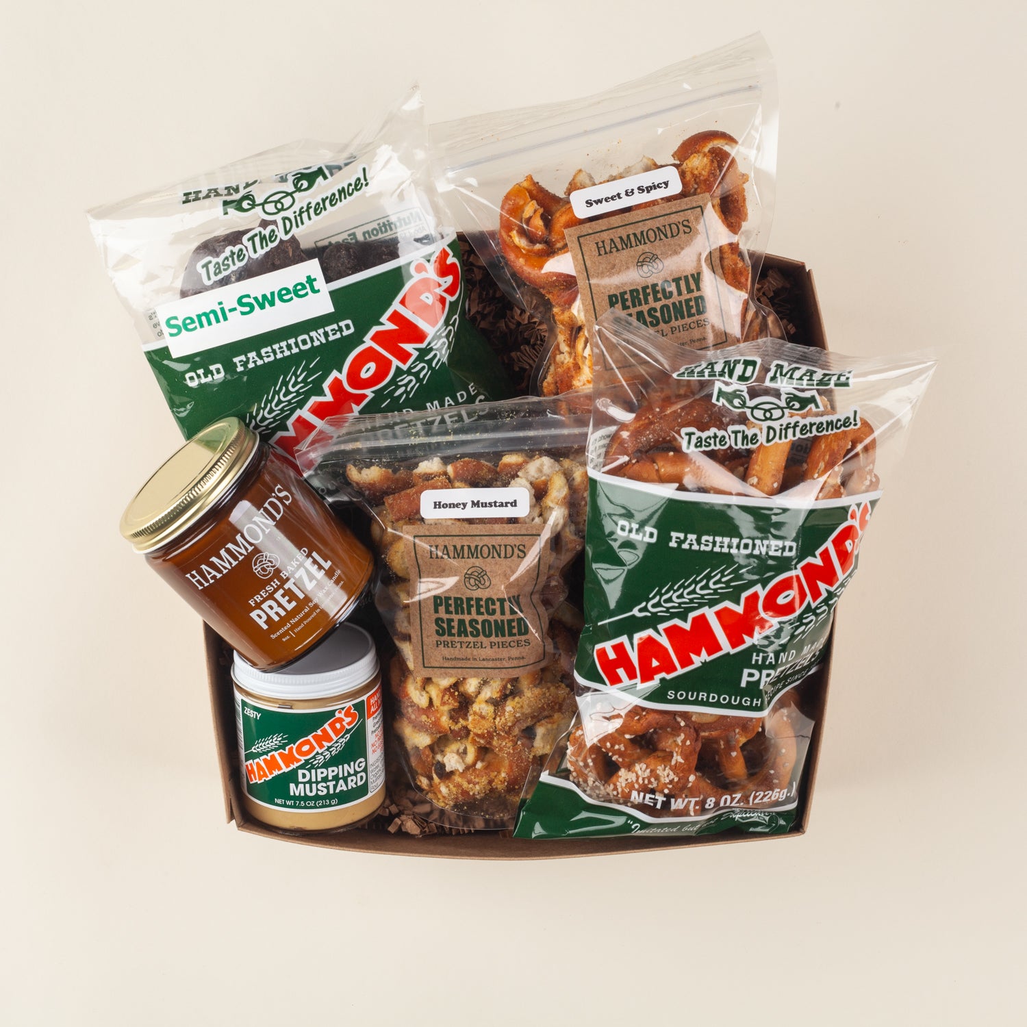 Hammond's Pretzel Fan Gift Box: handmade pretzels, sweet & spicy pieces, honey mustard pieces, dipping mustard & pretzel candle from Lancaster' City's oldest bakery.
