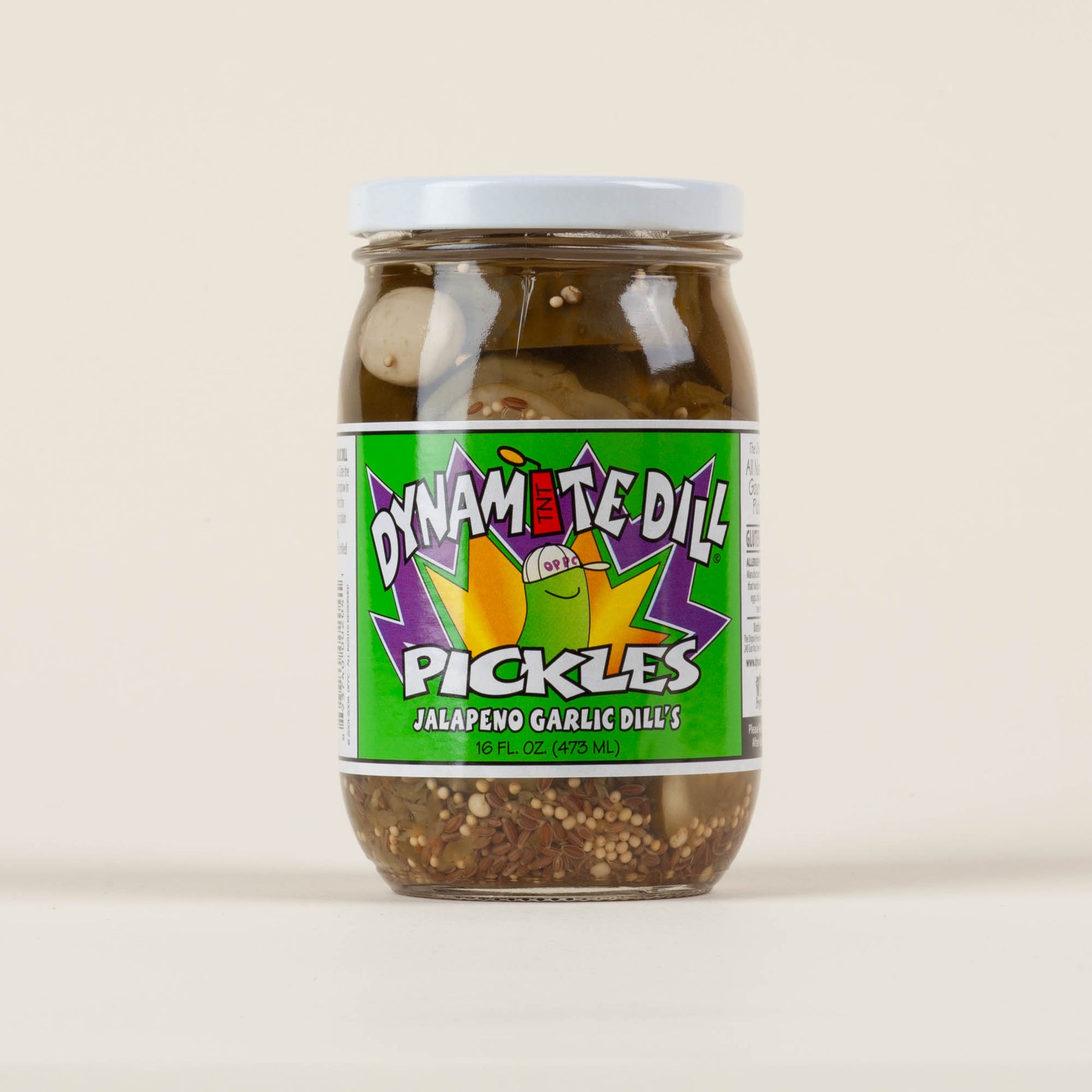 16oz jar of Dynamite Dill Jalapeño Garlic Dill pickles on a light background, handmade spicy garlic dill pickles made on King Street in Lancaster, PA.