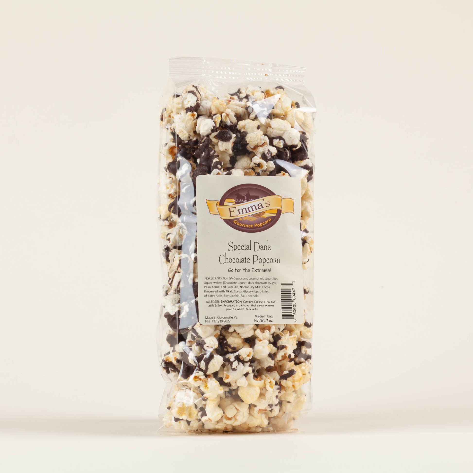 Medium bag of Emma's Special Dark popcorn on a light background, sweet and salty kettle popcorn drizzled with dark chocolate, gluten free, made in Lancaster County, PA.