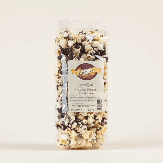 Medium bag of Emma's Special Dark popcorn on a light background, sweet and salty kettle popcorn drizzled with dark chocolate, gluten free, made in Lancaster County, PA.