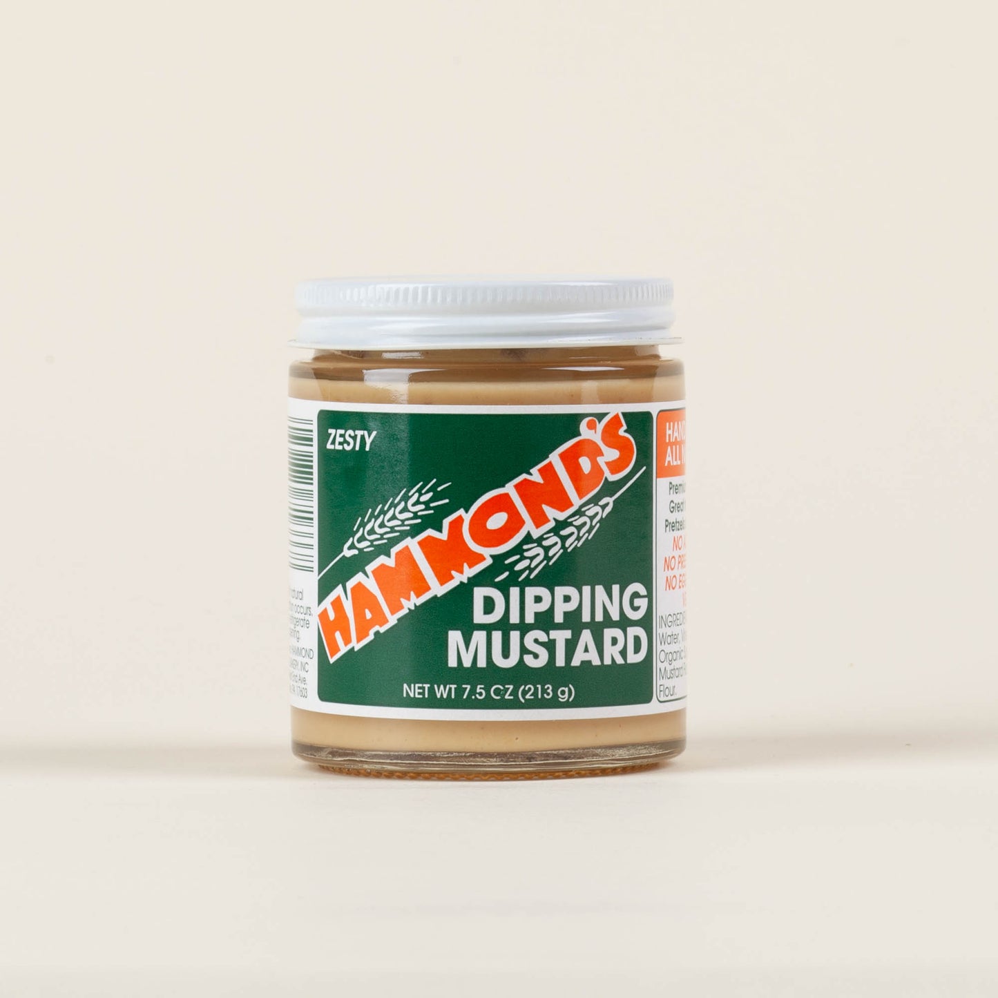 Seven-and-a-half-ounce jar of Hammond's Sweet & Zesty Dipping Mustard on a light background, handcrafted mustard made to pair with sourdough pretzels in Lancaster, PA.