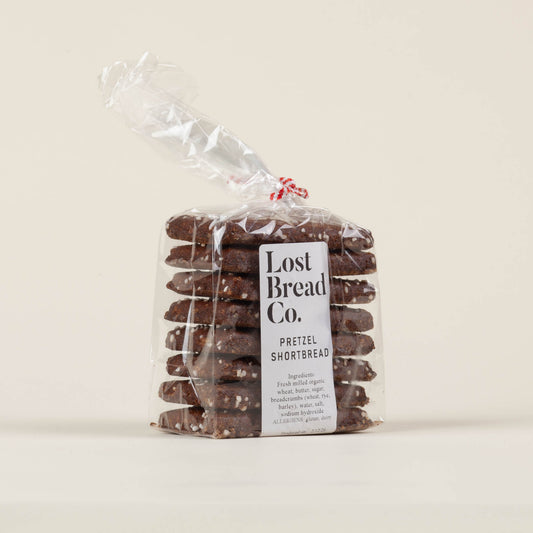 Lost Bread Co. pretzel shortbread cookies on a light background, cult-favorite malty salty shortbread made by James Beard nominated baker Alex Bois in Philadelphia, PA.