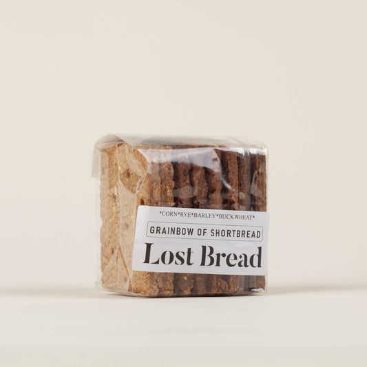 Lost Bread Co. Grainbow of Shortbread 8-pack on a light background, four grain-focused shortbread varieties made with fresh-milled organic grains in Philadelphia, PA.