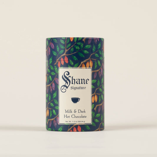 Shane Confectionery Signature Drinking Chocolate Mix canister on a light background, house-blend milk and dark drinking chocolate mix made in Philadelphia, PA since 1863.