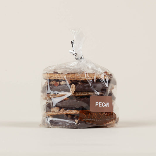 Gift pack of six pecan Stroopies stroopwafels on a white background, round cinnamon waffle cookies with caramel-pecan filling, handmade in Lancaster, PA.