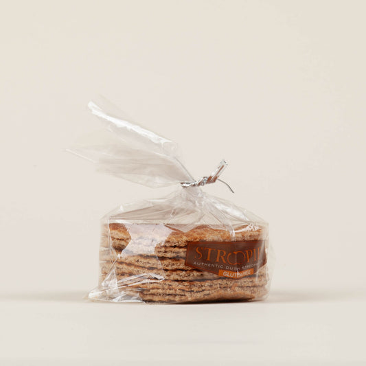 Gift pack of six gluten-free Stroopies stroopwafels on a white background, round cinnamon waffle cookies with caramel filling made in Lancaster, PA.
